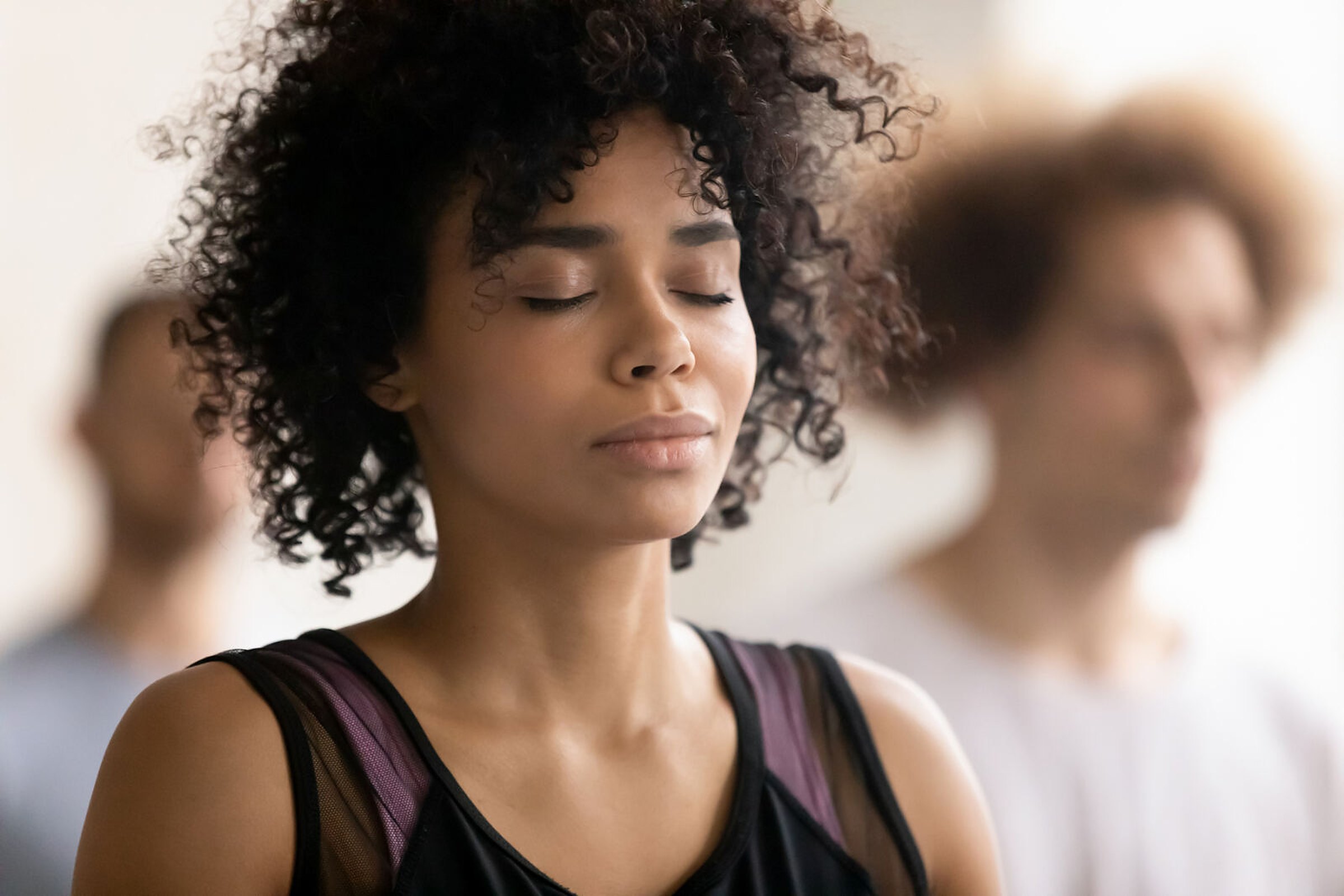 Woman meditating peacefully in a Bairnsdale mindfulness class